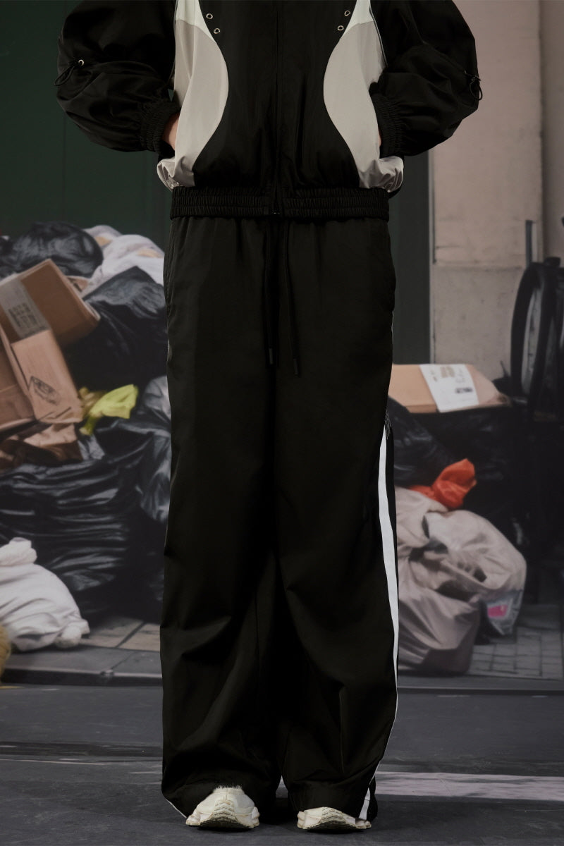 Panel Line Nylon Track Pants